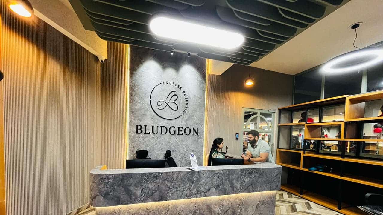 Bludgeon Athletics reception desk with the Endless Potential logo